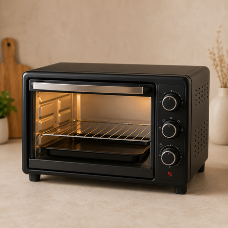 Black OTG oven on kitchen countertop.