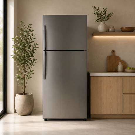 Modern stainless steel refrigerator in a minimalist kitchen.